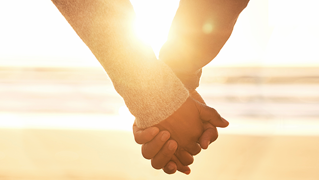 Partners holding hands