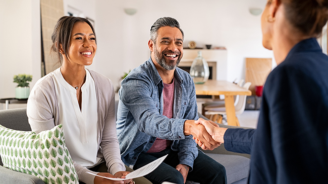 couple meeting financial adviser