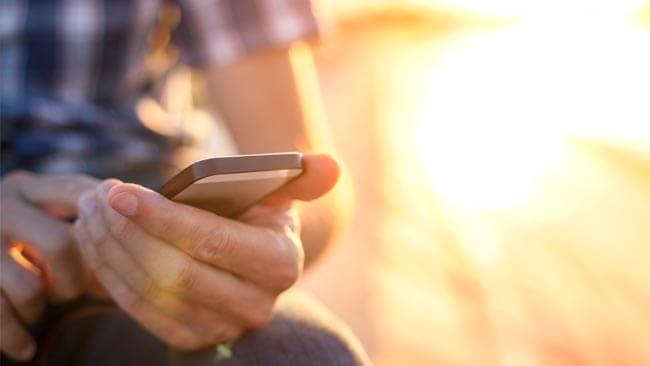 man browsing on phone