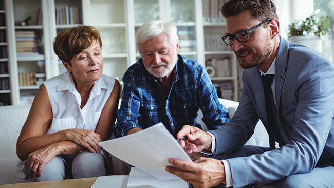 adviser with senior couple