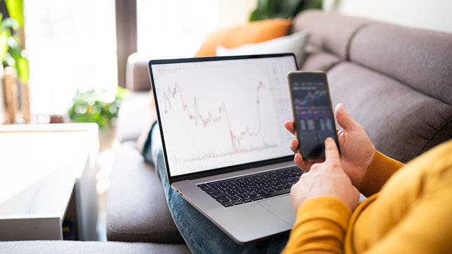 man looking at performance graph