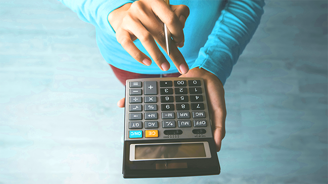 person with a calculator