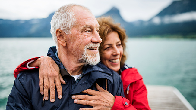 senior couple by lake