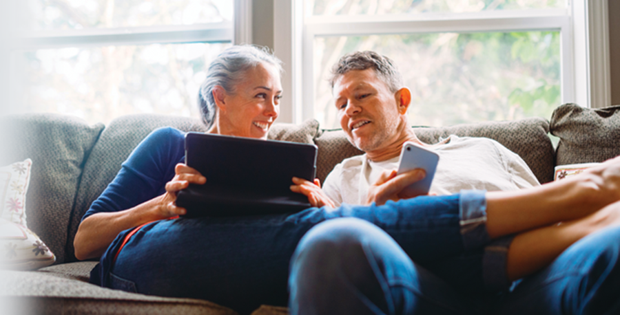 a couple planning on their laptops