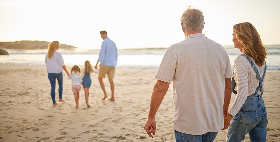 family on beach sunrise